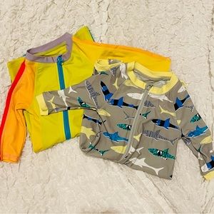 TWO SwimZip Rompers